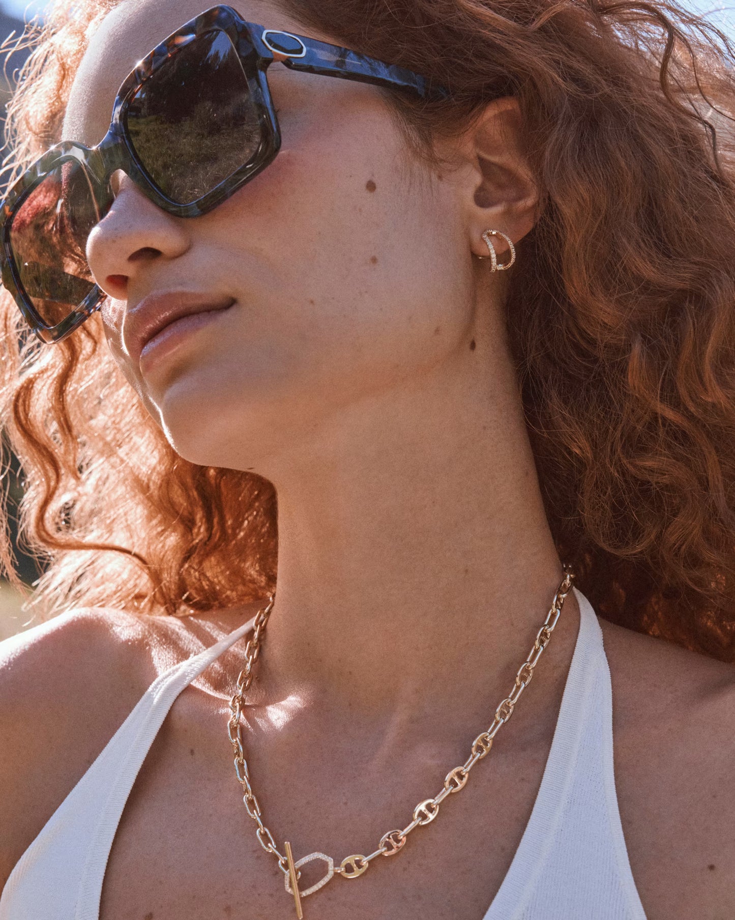 Daphne Pave Huggie Earrings Gold White CZ